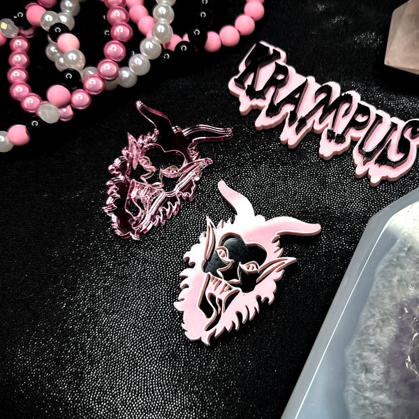Pink / black Krampus head clips