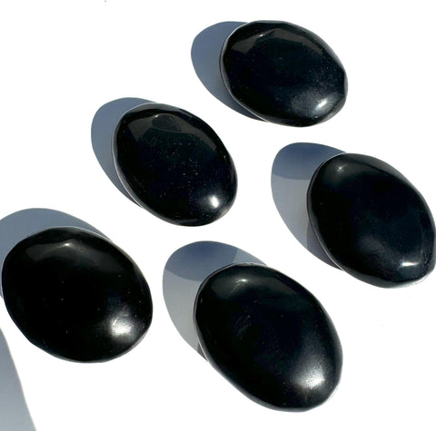 Obsidian palm stone