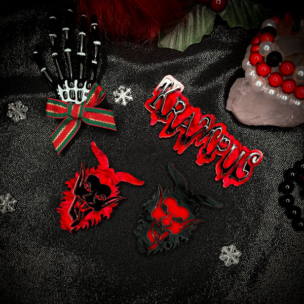 Red/ black Krampus head clips