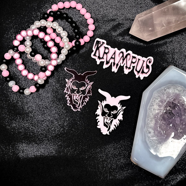 Pink / black Krampus head clips