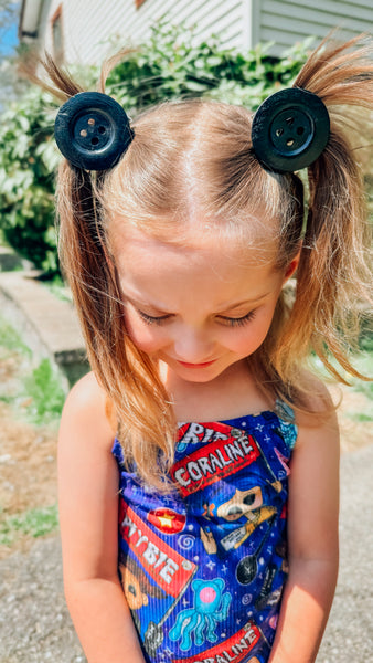 Button hair clips